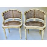 BERGERES, a pair, French Louis XVI style, grey painted, gilt and cane panelled. (2)