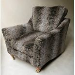 ARMCHAIR BY DURESTA, spotted two tone printed velvet with brass castors. 92cm W