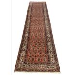 ANTIQUE MALAYER RUNNER, 348cm x 95cm, all over boteh design.