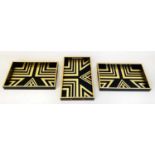 COCKTAIL TRAYS, a set of three, 40cm x 25cm, black and gold Art Deco style. (3)