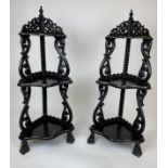 BURMESE CORNER ETAGERES, a pair, 123cm H x 52cm W, carved hardwood, three tiers raised on paw