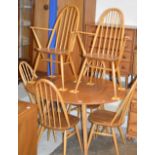 ERCOL LIGHT OAK TABLE WITH 6 CHAIRS