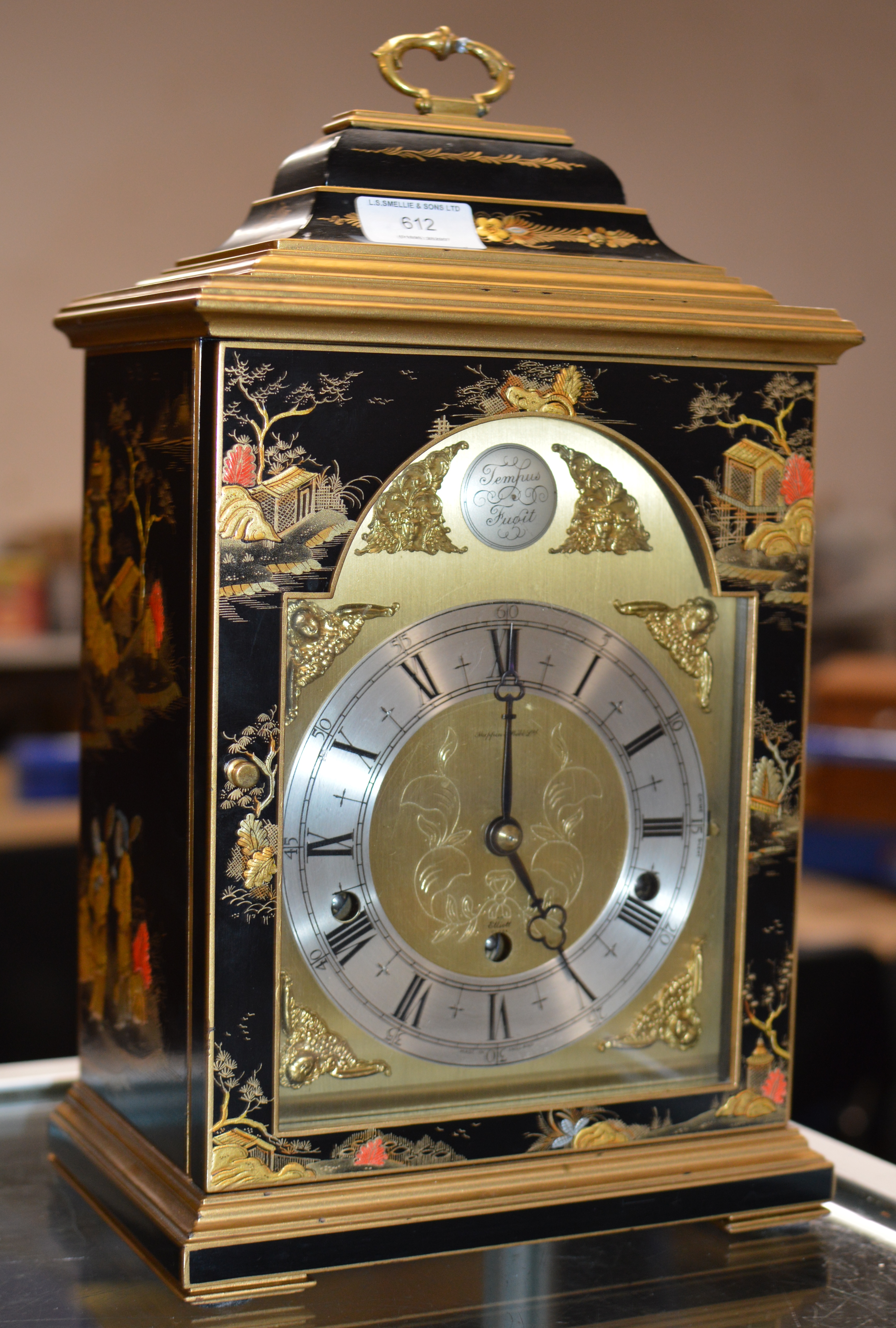 AN ELLIOT BLACK CHINOISERIE BRACKET STYLE MANTLE CLOCK, RETAILED BY MAPPIN & WEBB, WITH KEY