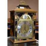 AN ELLIOT BLACK CHINOISERIE BRACKET STYLE MANTLE CLOCK, RETAILED BY MAPPIN & WEBB, WITH KEY