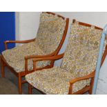 PAIR OF TEAK FRAMED ARM CHAIRS