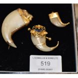 FINE GROUP OF 3 GRADUATED ANIMAL CLAWS MOUNTED IN UNMARKED GOLD
