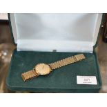 OMEGA DEVILLE LADIES WRIST WATCH ON 9 CARAT GOLD BRACELET - APPROXIMATE WEIGHT = 45 GRAMS