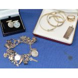 ASSORTED SILVER JEWELLERY, VARIOUS BANGLES, CHARM BRACELET, HEAVY GAUGE GENTS RING, INGOT & PAIR