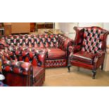 3 PIECE CHESTERFIELD OX BLOOD LEATHER LOUNGE SUITE COMPRISING 3 SEATER SETTEE, WING BACK ARM CHAIR &