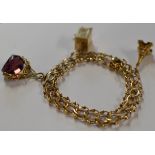 14 CARAT GOLD CHARM BRACELET WITH 3 VARIOUS CHARMS - APPROXIMATE WEIGHT = 28.1 GRAMS