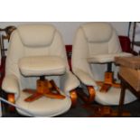 PAIR OF CREAM LEATHER EASY CHAIRS WITH MATCHING FOOT STOOLS