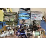 TRAY WITH ASSORTED FISHING REELS, SPINNING REELS, MULTIPLIER REELS ETC