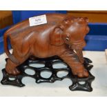 ORIENTAL CARVED WOODEN ELEPHANT DISPLAY ON FITTED STAND