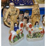 PAIR OF STAFFORDSHIRE STYLE ORNAMENTS & PAIR OF MODERN EASTERN STYLE FIGURINE DISPLAYS