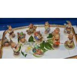 12 VARIOUS HUMMEL FIGURINE ORNAMENTS