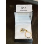 18 CARAT GOLD DIAMOND SOLITAIRE RING & 9 CARAT GOLD BAND