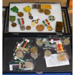 2 DISPLAY CASES WITH ASSORTED MEDALS