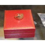 9 CARAT GOLD SIGNET RING WITH DIAMOND CHIP INSET - APPROXIMATE WEIGHT = 5.5 GRAMS