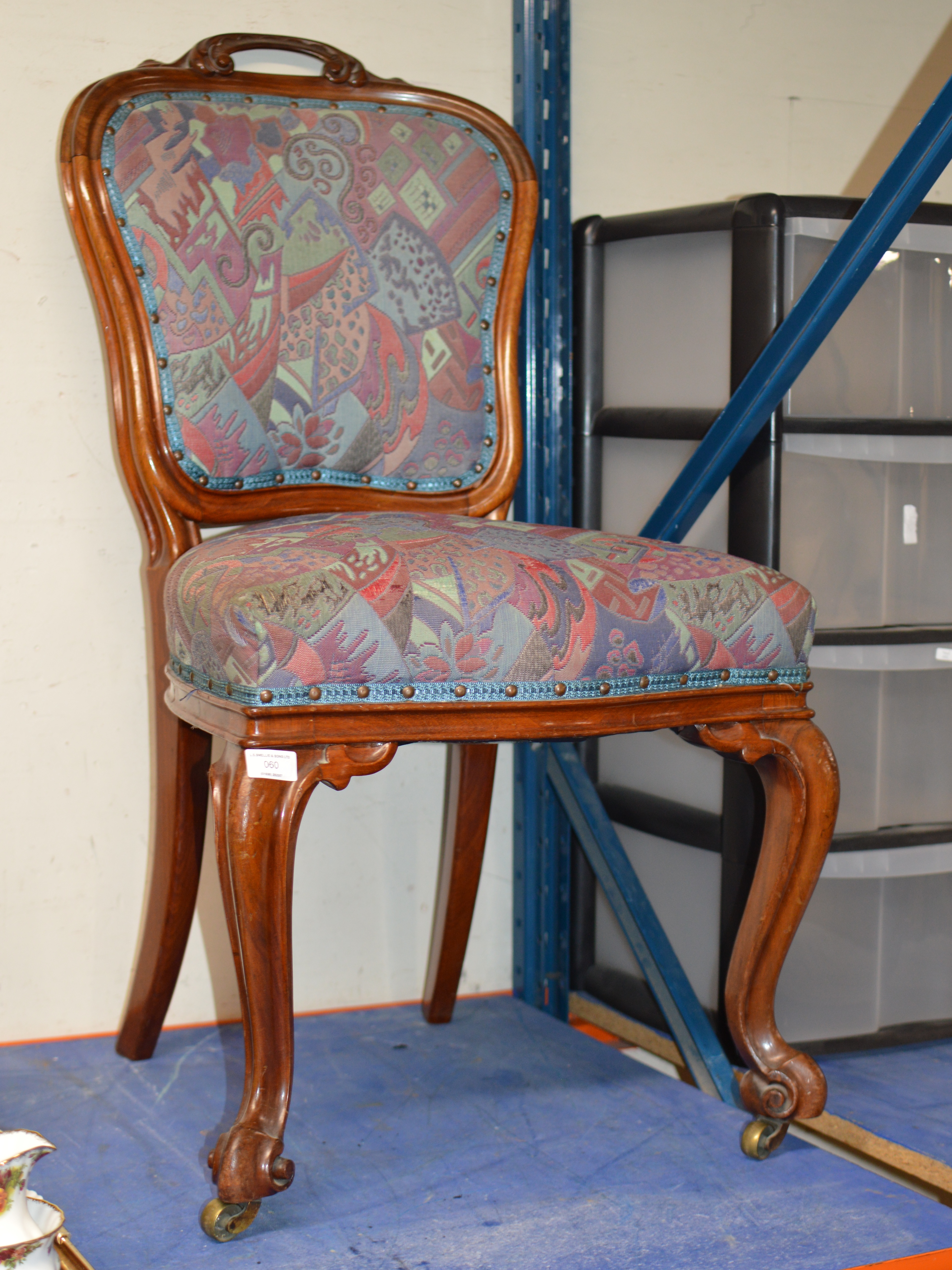 VICTORIAN MAHOGANY PADDED CHAIR ON BRASS CASTORS