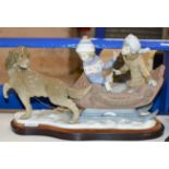 LARGE LLADRO CENTREPIECE DISPLAY - TWO CHILDREN ON A SLEDGE WITH DOG, ON WOODEN STAND