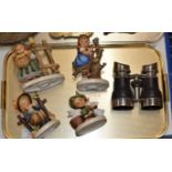TRAY WITH PAIR OF LEATHER BOUND BINOCULARS & 4 VARIOUS HUMMEL FIGURINES