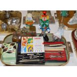 TRAY CONTAINING VARIOUS DRAWING INSTRUMENTS, BALANCE SCALES, COLOURED GLASS CLOWN ORNAMENT, LLADRO