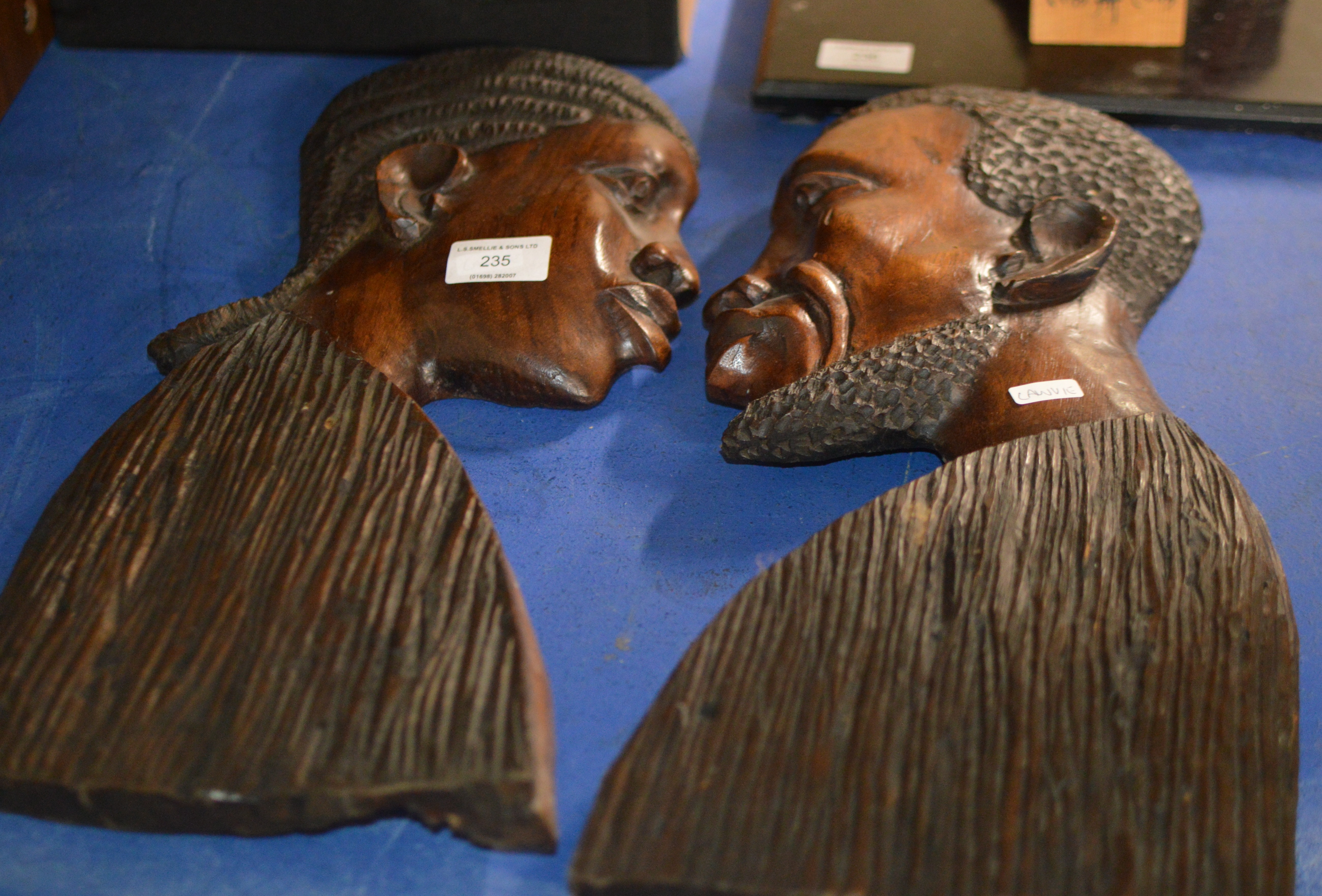 2 CARVED WOODEN AFRICAN BUST DISPLAYS