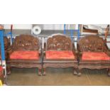 SET OF 4 INDIAN STYLE HEAVY CARVED WOODEN ARM CHAIRS WITH PADDED SEATS