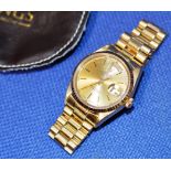 ROLEX GENTS 18 CARAT GOLD OYSTER PERPETUAL DAY DATE WRIST WATCH ON 18 CARAT GOLD BRACELET