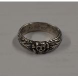 GERMAN STYLE SILVER SKULL MOTIF RING, DATED 1940