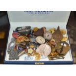 BOX WITH VARIOUS BADGES, WATCH PARTS, BUTTONS, SMALL PADLOCK, MILITARY STYLE BADGES ETC