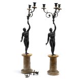 Coppia di candelabri in bronzo a tre fiamme