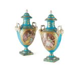 PAIR OF LARGE SÈVRES STYLE URNS AND COVERS 19TH CENTURY