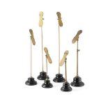 GROUP OF BRASS AND POTTERY SHOE DISPLAY STANDS LATE 19TH/ EARLY 20TH CENTURY