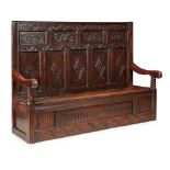 CARVED OAK SETTLE LATE 17TH/ EARLY 18TH CENTURY AND LATER