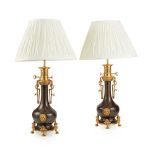 PAIR OF FRENCH GILT AND PATINATED BRONZE MODERATOR LAMPS 19TH CENTURY