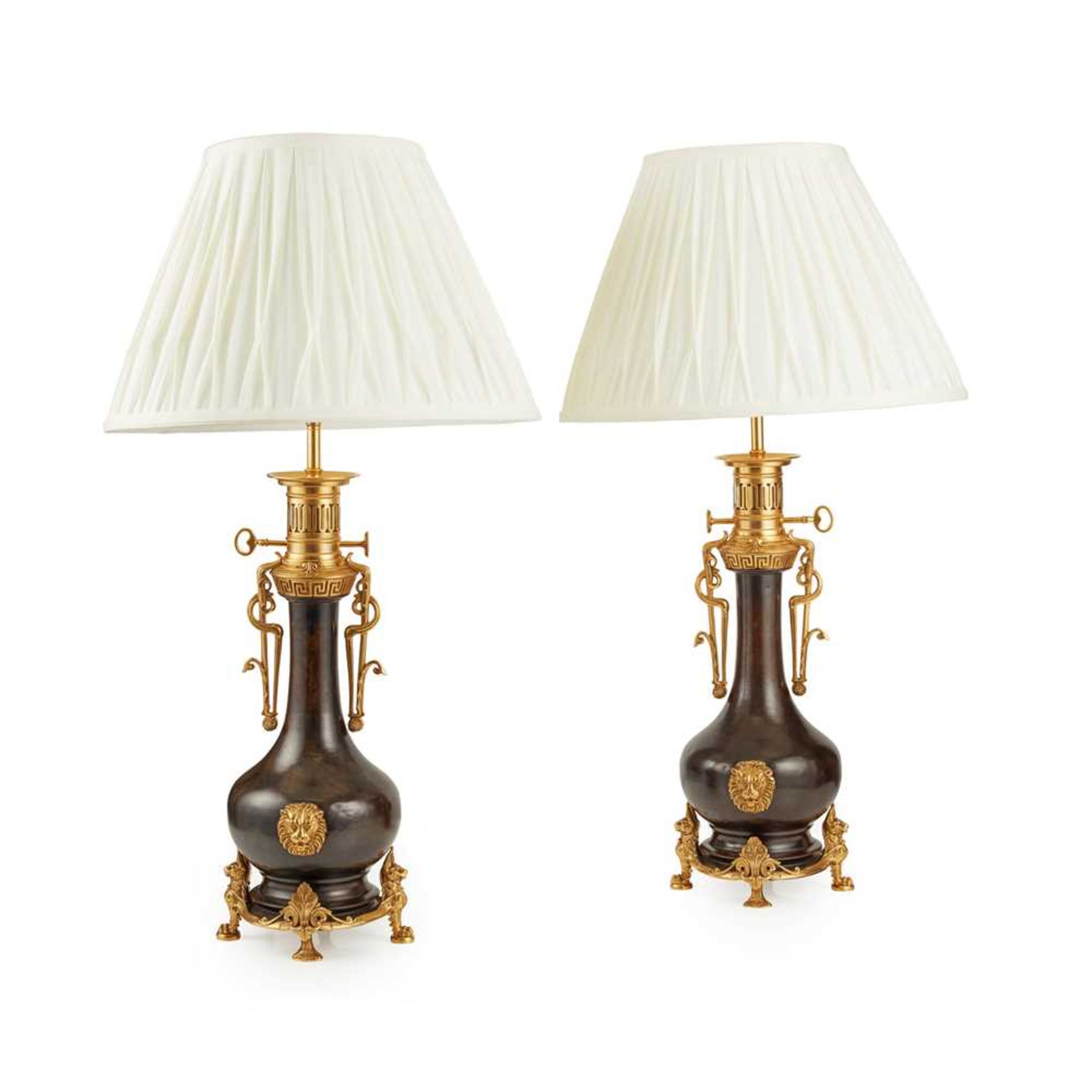 PAIR OF FRENCH GILT AND PATINATED BRONZE MODERATOR LAMPS 19TH CENTURY