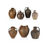 SEVEN VARIOUS CONTINENTAL EARTHENWARE STORAGE VESSELS 19TH CENTURY