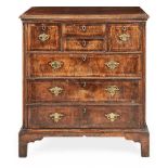 GEORGE II WALNUT AND FEATHER BANDED CHEST OF DRAWERS MID 18TH CENTURY