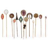 A collection of gem set tie-pins