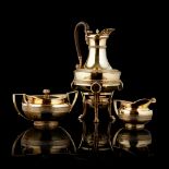 A late George III 'Regency style' silver-gilt coffee pot and burner with associated sugar and cream