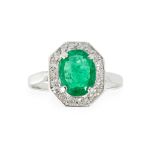 An emerald and diamond set ring