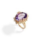An amethyst, diamond and sapphire set cocktail ring