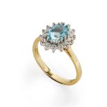 An aquamarine and diamond set cluster ring