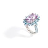 A kunzite and blue topaz set cocktail ring