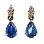 A pair of sapphire and diamond set pendant earrings