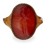 A gold mounted carnelian intaglio ring