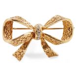 A diamond set bow brooch, Boucheron