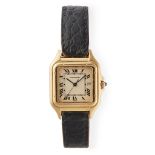 Cartier: a gentleman's gold wrist watch