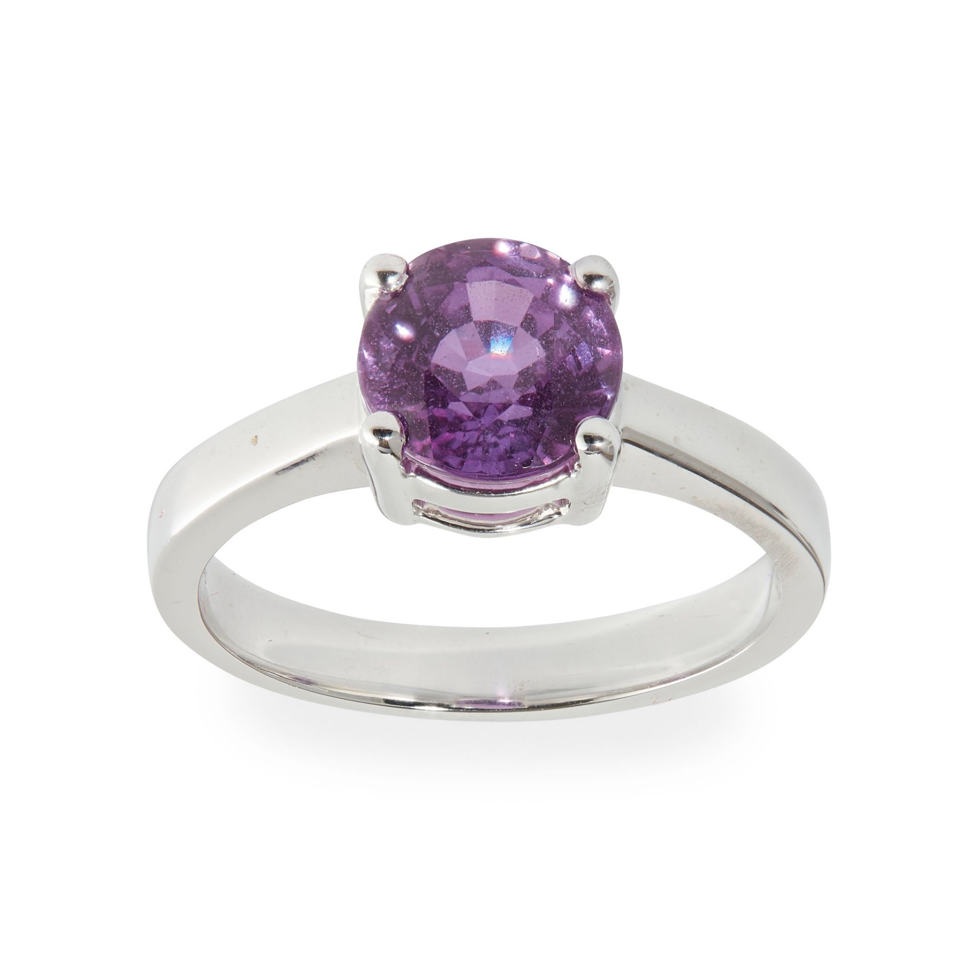 A pinkish-purple sapphire set ring